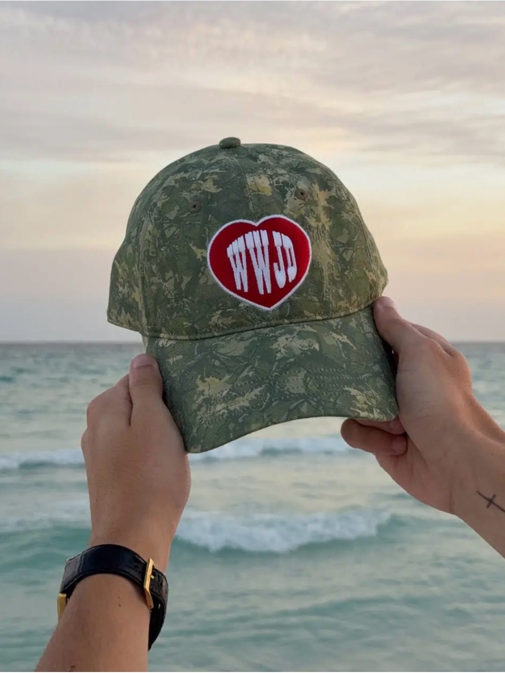 Elevated Faith. Camouflage Baseball Cap with Red Heart Patch - WWJD Accent